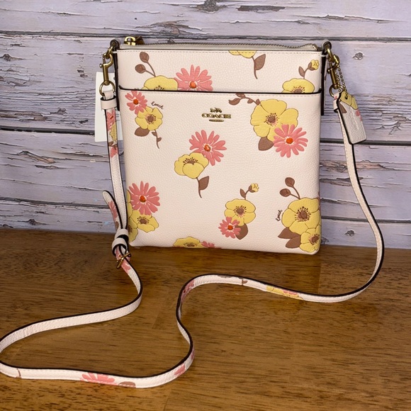 Coach Kitt floral messenger crossbody bag. - Picture 1 of 10